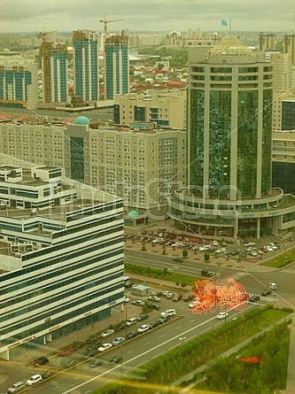 Astana Skyline behind glass