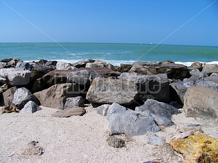 ocean behind rocks