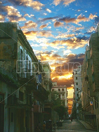 Cuban Sunset over buildings