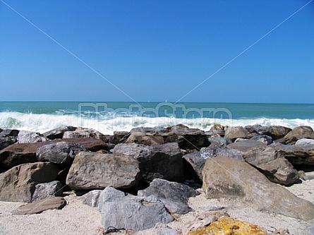 waves crashing over rocks