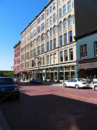 old style building and brick road